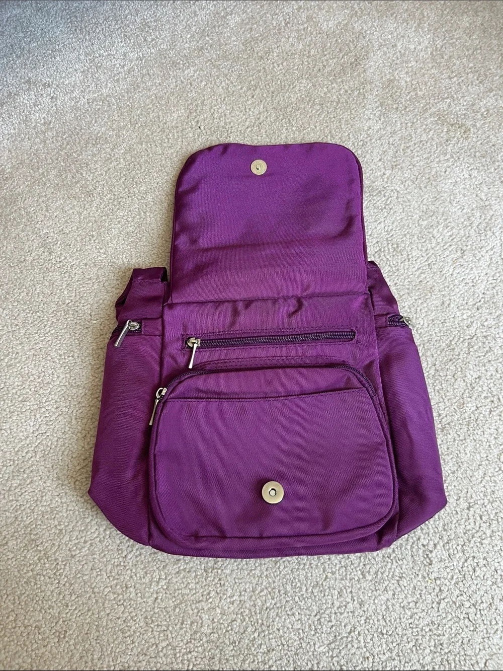 Compact Purple Crossbody Bag with Triple Front Zips